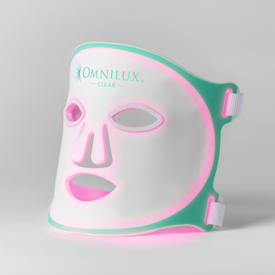 Omnilux Clear LED acne mask on face to reduce breakouts