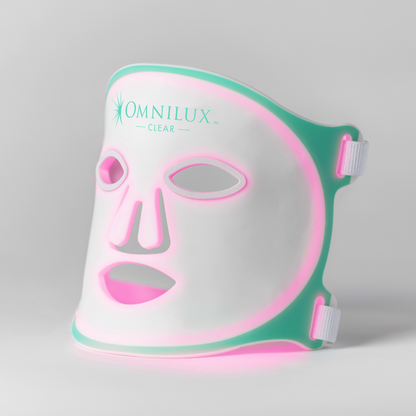Omnilux Clear LED acne mask on face to reduce breakouts