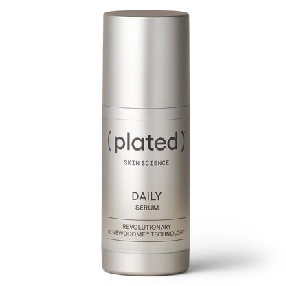 Silver skincare serum bottle labeled &